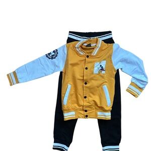 Yellow and White Varsity Jacket with Black Pants